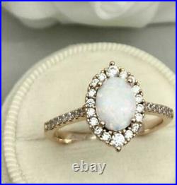 2.50Ct Oval Cut Opal Lab Created Engagement Ring In 14K Rose Gold Finish