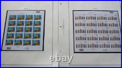 All 33 U. S. Commemorative Postage Stamp Panes for 2001. Two panes excluded